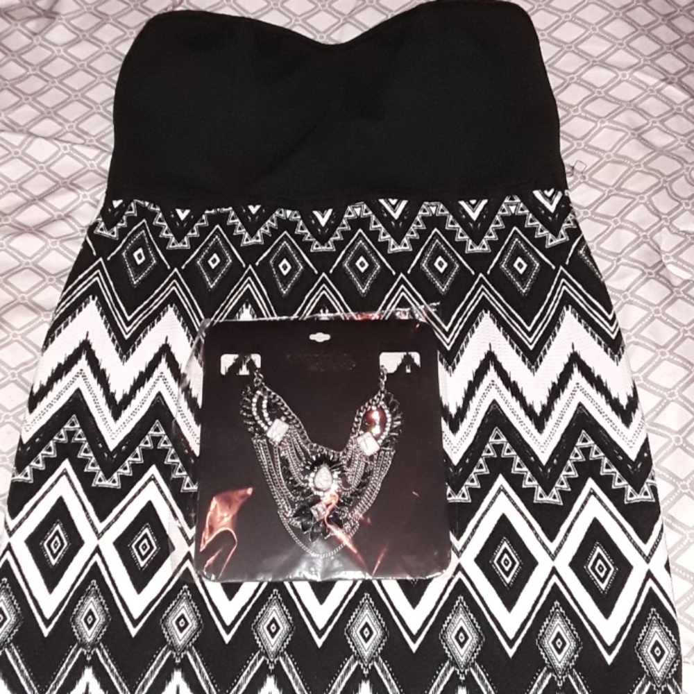 Strapless mini bodycon dress.
